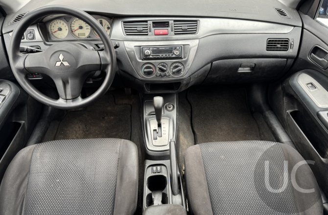 подержанный авто Mitsubishi Lancer 2006 года