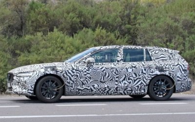 Шпионы сфотографировали спортивную версию Volvo V60 в камуфляже